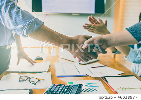 Business people shaking hands 46038977