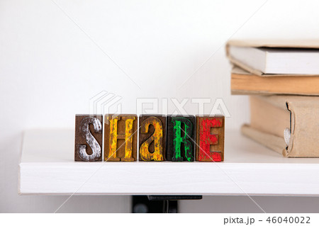 Share word from colored wooden letters Share word from colored wooden letters 46040022