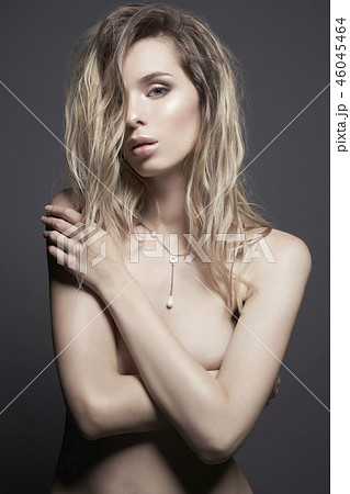Young beautiful blonde with silver jewelry 46045464