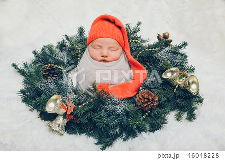 Newborn baby wrapped in a diaper Newborn baby wrapped in a diaper 46048228