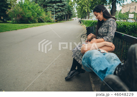 the guy lies at the girl on his knees 46048229