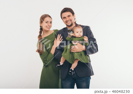 mom, dad, child. Fashion in green and grey 46048230