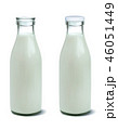 Filled unopened and opened milk bottle isolated  46051449