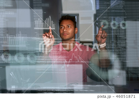 Young indian analyst is comparing data and make conclusions Young indian analyst is comparing data and make conclusions 46051871