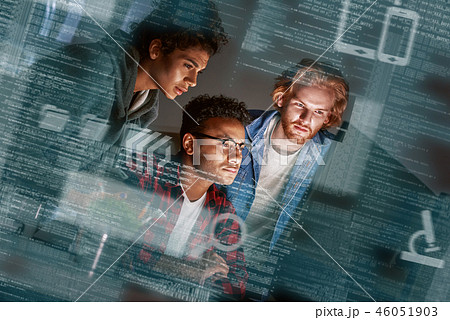 Cropped shot of young developers working overtime Cropped shot of young developers working overtime 46051903