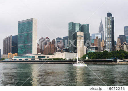 Sailing ship on East River against skyline of New York City 46052256