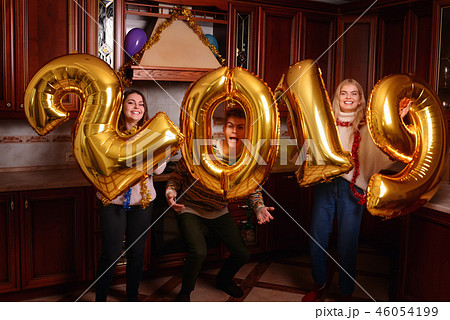 New 2019 Year is coming. Group of cheerful New 2019 Year is coming. Group of cheerful 46054199