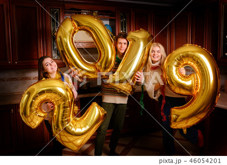 New 2019 Year is coming. Group of cheerful New 2019 Year is coming. Group of cheerful 46054201