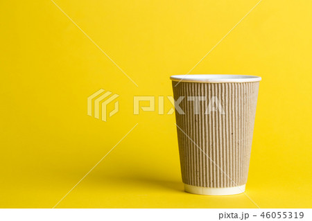 coffee in a glass on a yellow background 46055319