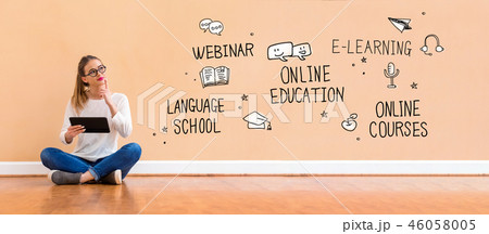 Online education theme with woman using a tablet Online education theme with woman using a tablet 46058005