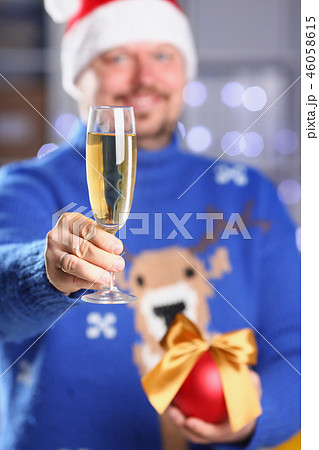 Bearded smiling man wearing warm blue sweater 46058615