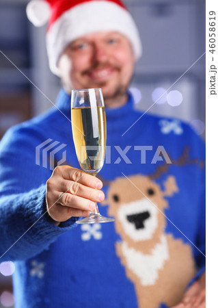 Bearded smiling man wearing warm blue sweater 46058619