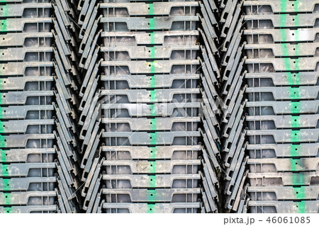 Plastic containers are stacked perfectly together 46061085