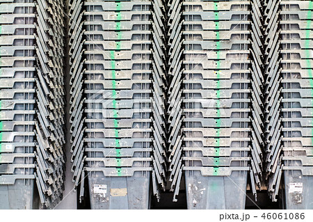 Plastic containers are stacked perfectly together 46061086