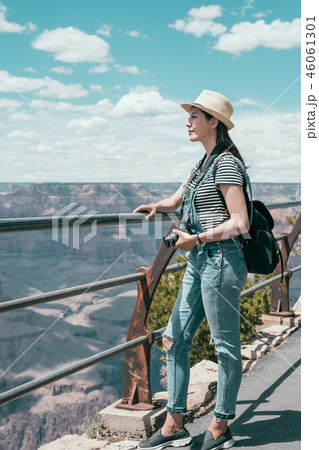 tourist hobby photographing by slr camera. tourist hobby photographing by slr camera. 46061301