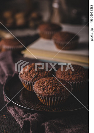 Homemade chocolate muffins with chocolate topping Homemade chocolate muffins with chocolate topping 46064868