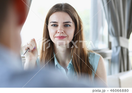 Beautiful smiling cheerful girl at workplace 46066880