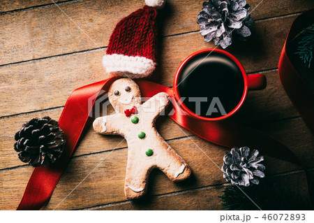 Cup of coffee and Christmas gingerbread man 46072893