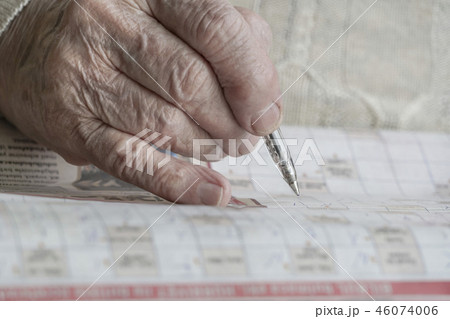 wrinkled hand solving puzzle wrinkled hand solving puzzle 46074006