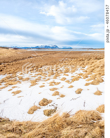 Field with snow in winter season, Iceland 46078457