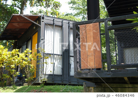 Building made from refurbished shipping containers 46084346