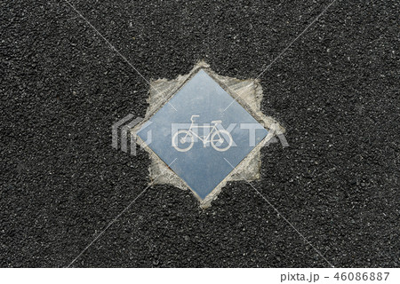 Bike lane symbol on ground 46086887
