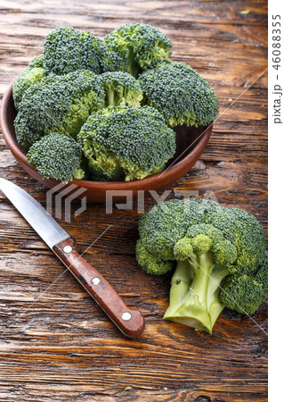 broccoli in a clay plate on a wooden table broccoli in a clay plate on a wooden table 46088355