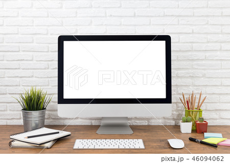workspace with computer with blank white screen workspace with computer with blank white screen 46094062