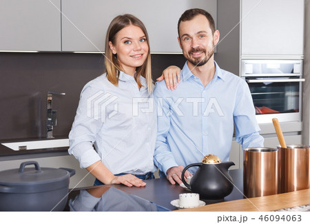 Loving couple in kitchen Loving couple in kitchen 46094063