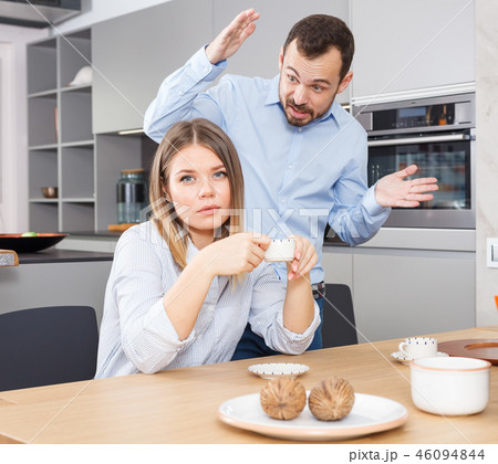 Family squabbling in kitchen Family squabbling in kitchen 46094844