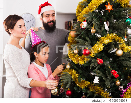 Family members preparing for Christmas 46096863