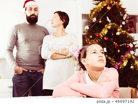 Parents lecturing daughter at Christmas 46097192