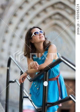 Girl walking in city streets 46098224