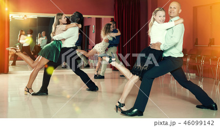 Couples enjoying tango Couples enjoying tango 46099142