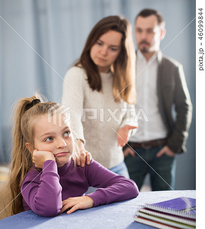 Parents lecturing daughter 46099844