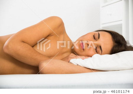 Woman sleeping in bed Woman sleeping in bed 46101174