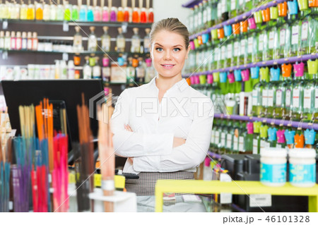Portrait of salesgirl in perfume shop 46101328