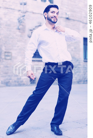Passionate man dancing alone outdoors Passionate man dancing alone outdoors 46102909