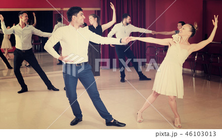 People practicing vigorous lindy hop movements 46103013