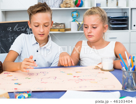 Brother with sister are playing in board game 46103404