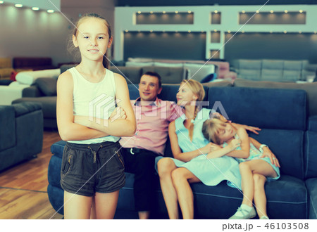 Postrait of child girl is happying of new sofa Postrait of child girl is happying of new sofa 46103508