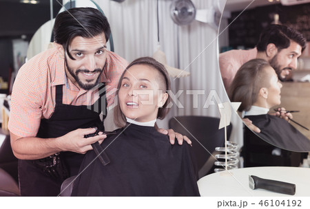 Portrait of young man hairdresser and female Portrait of young man hairdresser and female 46104192