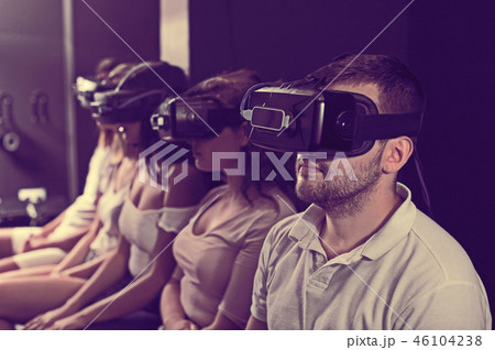People wearing virtual reality goggles 46104238