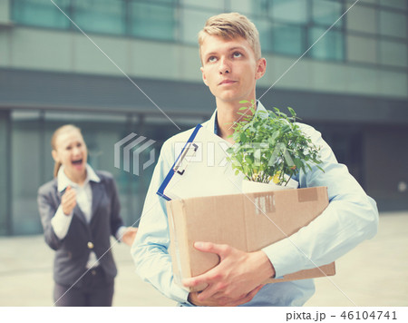 Serious man is standing upset near office 46104741