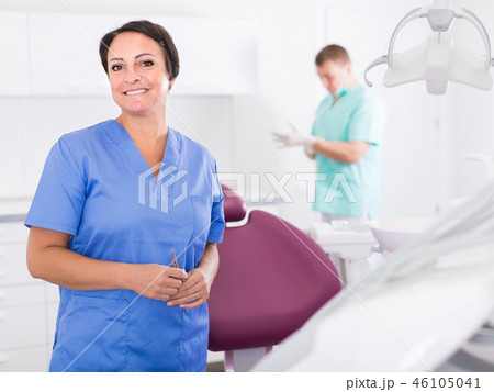 professional worker with assistant professional worker with assistant 46105041