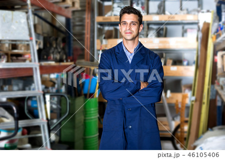 Man in uniform on his workplace 46105406