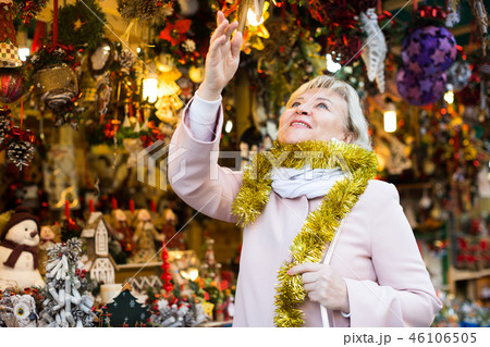 adult woman on shiny tinsel on fair adult woman on shiny tinsel on fair 46106505