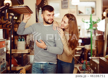 Couple looking for hallstand in shop Couple looking for hallstand in shop 46106751
