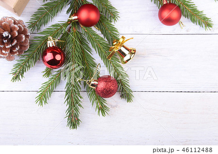 Happy Holidays. New Year or Christmas decorations with gift boxes, candles and balls. greeting card. Happy Holidays. New Year or Christmas decorations with gift boxes, candles and balls. greeting card. 46112488