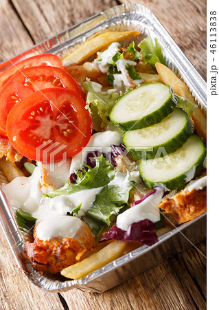 Kapsalon is a fast food dish Kapsalon is a fast food dish 46113838